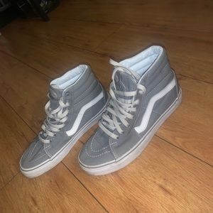 White and gray high top vans